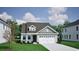 Charming single-story home with a two-car garage, lush lawn, and inviting curb appeal at 1109 Hainer Place Dr, Conway, SC 29526