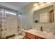 Traditional bathroom with a shower-tub combination, single sink, and light green walls at 113 Camrose Way, Myrtle Beach, SC 29588