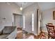 Inviting home foyer featuring a white front door, hardwood floors, and neutral decor at 113 Camrose Way, Myrtle Beach, SC 29588