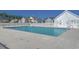 Community pool with clear water and a spacious deck, perfect for relaxing by the water at 113 Camrose Way, Myrtle Beach, SC 29588