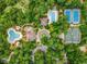 Aerial view of community amenities featuring pools, tennis courts, and green spaces at 1206 Spinnaker Dr., North Myrtle Beach, SC 29582