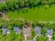 Aerial view showcasing homes bordering lush green golf course at 1206 Spinnaker Dr., North Myrtle Beach, SC 29582