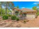 Exterior view of the home showcasing well-maintained grounds, and landscaping at 1206 Spinnaker Dr., North Myrtle Beach, SC 29582