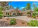 Charming home featuring manicured landscaping, a driveway, and traditional architectural details at 1206 Spinnaker Dr., North Myrtle Beach, SC 29582