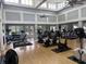 Bright and airy gym with hardwood floors, fitness equipment, and plenty of natural light at 1206 Spinnaker Dr., North Myrtle Beach, SC 29582