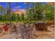 Outdoor patio area with furniture, a grill, and a view of the lush backyard at 1206 Spinnaker Dr., North Myrtle Beach, SC 29582