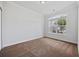 Bedroom featuring a large window, carpet and white walls at 122 Parmelee Dr. # A, Murrells Inlet, SC 29576