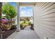 View of townhomes with lush landscaping and inviting curb appeal from the entryway at 122 Parmelee Dr. # A, Murrells Inlet, SC 29576
