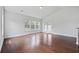 Living room with large windows overlooking backyard at 122 Parmelee Dr. # A, Murrells Inlet, SC 29576