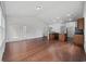 Spacious living room with hardwood floors, large windows, and an open floor plan at 122 Parmelee Dr. # A, Murrells Inlet, SC 29576