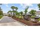 Beautiful landscaped entry to the community with lush landscaping, trees and well maintained grounds at 122 Parmelee Dr. # A, Murrells Inlet, SC 29576