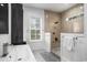 Contemporary bathroom with shower, modern fixtures, and natural light at 1279 Fiddlehead Way, Myrtle Beach, SC 29579