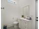 Bright half bathroom featuring a white vanity with modern fixtures, toilet, and stylish decor at 1279 Fiddlehead Way, Myrtle Beach, SC 29579