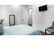 Comfortable bedroom with soft lighting, a decorative mirror, and a relaxing atmosphere at 1279 Fiddlehead Way, Myrtle Beach, SC 29579