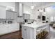 Spacious kitchen with island seating, modern appliances, and ample counter space at 1279 Fiddlehead Way, Myrtle Beach, SC 29579