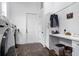 Well-lit laundry room with modern washer and dryer and ample storage space at 1279 Fiddlehead Way, Myrtle Beach, SC 29579