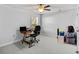 Simple bedroom design featuring neutral walls, a small desk, and carpeted floors at 1303 Bermuda Grass Dr., Myrtle Beach, SC 29579