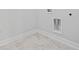 Laundry room with utility connections, tiled floor, and white walls at 1303 Bermuda Grass Dr., Myrtle Beach, SC 29579