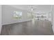Bright and airy living room boasts luxury vinyl plank flooring and generous natural light at 1303 Bermuda Grass Dr., Myrtle Beach, SC 29579