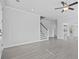 Spacious living room featuring hard surface floors, fresh paint, bright light and views to the stairs and other rooms at 1303 Bermuda Grass Dr., Myrtle Beach, SC 29579