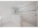 Modern walk-in shower with decorative tile and glass partition that adds a touch of elegance to the bathroom at 1303 Bermuda Grass Dr., Myrtle Beach, SC 29579