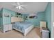 Comfortable bedroom boasting a bed, nightstands, and coastal decor, with plenty of natural light at 1360 Turkey Ridge Rd. # A, Surfside Beach, SC 29575
