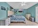 Comfortable bedroom boasting a bed, nightstands, and coastal decor, with plenty of natural light at 1360 Turkey Ridge Rd. # A, Surfside Beach, SC 29575