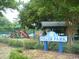 View of Fuller Park featuring playground equipment, a gazebo, and lush greenery at 1360 Turkey Ridge Rd. # A, Surfside Beach, SC 29575