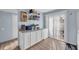 Bright dining area with counter space and walk-out access to the rear of the home at 1360 Turkey Ridge Rd. # A, Surfside Beach, SC 29575