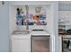 Convenient laundry area inside closet featuring washer, dryer, and storage shelves at 1360 Turkey Ridge Rd. # A, Surfside Beach, SC 29575