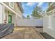 Private patio with lush greenery and a white fence, ideal for outdoor gatherings and relaxation at 1360 Turkey Ridge Rd. # A, Surfside Beach, SC 29575