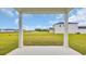 View of the home's backyard from the covered porch at 1372 Palm Springs Paloma Dr, Longs, SC 29568