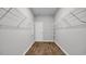 Large walk-in closet with ample wire shelving and durable floors providing excellent storage at 1372 Palm Springs Paloma Dr, Longs, SC 29568