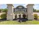 Elegant community sign for Brittany Park set amidst well-maintained landscaping at 1435 Saint Thomas Circle # E-1, Myrtle Beach, SC 29577