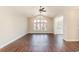 Bright living room with laminate flooring and a large window with transoms allowing ample natural light at 1435 Saint Thomas Circle # E-1, Myrtle Beach, SC 29577