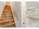 View of wooden staircase leading up to a garage with an automatic door at 1435 Saint Thomas Circle # E-1, Myrtle Beach, SC 29577