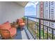 Balcony with patio furniture overlooking the ocean, beach, and pool area at 1501 S Ocean Blvd. # 1250, Myrtle Beach, SC 29577
