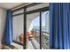 Condo balcony with seating, ocean view, and a view of a neighboring building at 1501 S Ocean Blvd. # 1250, Myrtle Beach, SC 29577