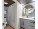 Stylish bathroom with an enclosed shower and tub, a toilet, and a gray vanity at 1501 S Ocean Blvd. # 1250, Myrtle Beach, SC 29577