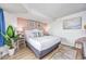 Inviting bedroom with a comfortable bed, side tables, decorative accents, and cozy rug at 1501 S Ocean Blvd. # 1250, Myrtle Beach, SC 29577