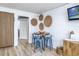 Charming dining area with rustic decor, seating for four, and cozy ambiance at 1501 S Ocean Blvd. # 1250, Myrtle Beach, SC 29577