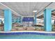 Large indoor pool and fountain area with blue tile at 1501 S Ocean Blvd. # 1250, Myrtle Beach, SC 29577