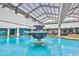 Indoor pool area with a decorative fountain in the center at 1501 S Ocean Blvd. # 1250, Myrtle Beach, SC 29577