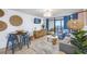 Cozy living area with ocean view balcony, beachy decor, and comfortable seating arrangement at 1501 S Ocean Blvd. # 1250, Myrtle Beach, SC 29577