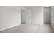 A bedroom includes carpet, neutral paint, and doors to other rooms at 154 Six Mile Creek Dr., Georgetown, SC 29440