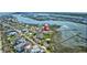 Aerial view of condo complex surrounded by trees, bay and waterway at 1582 S Waccamaw Dr. # 34, Garden City Beach, SC 29576