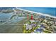 Aerial view of condo complex near the ocean, bay and neighborhood at 1582 S Waccamaw Dr. # 34, Garden City Beach, SC 29576