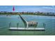 Distant aerial view of condo complex located on the bay near pier at 1582 S Waccamaw Dr. # 34, Garden City Beach, SC 29576