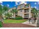 Rear of the condo complex with grilling area, patio and lush landscaping at 1582 S Waccamaw Dr. # 34, Garden City Beach, SC 29576
