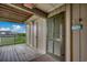 Hallway leading to a balcony with views of the town at 1582 S Waccamaw Dr. # 34, Garden City Beach, SC 29576